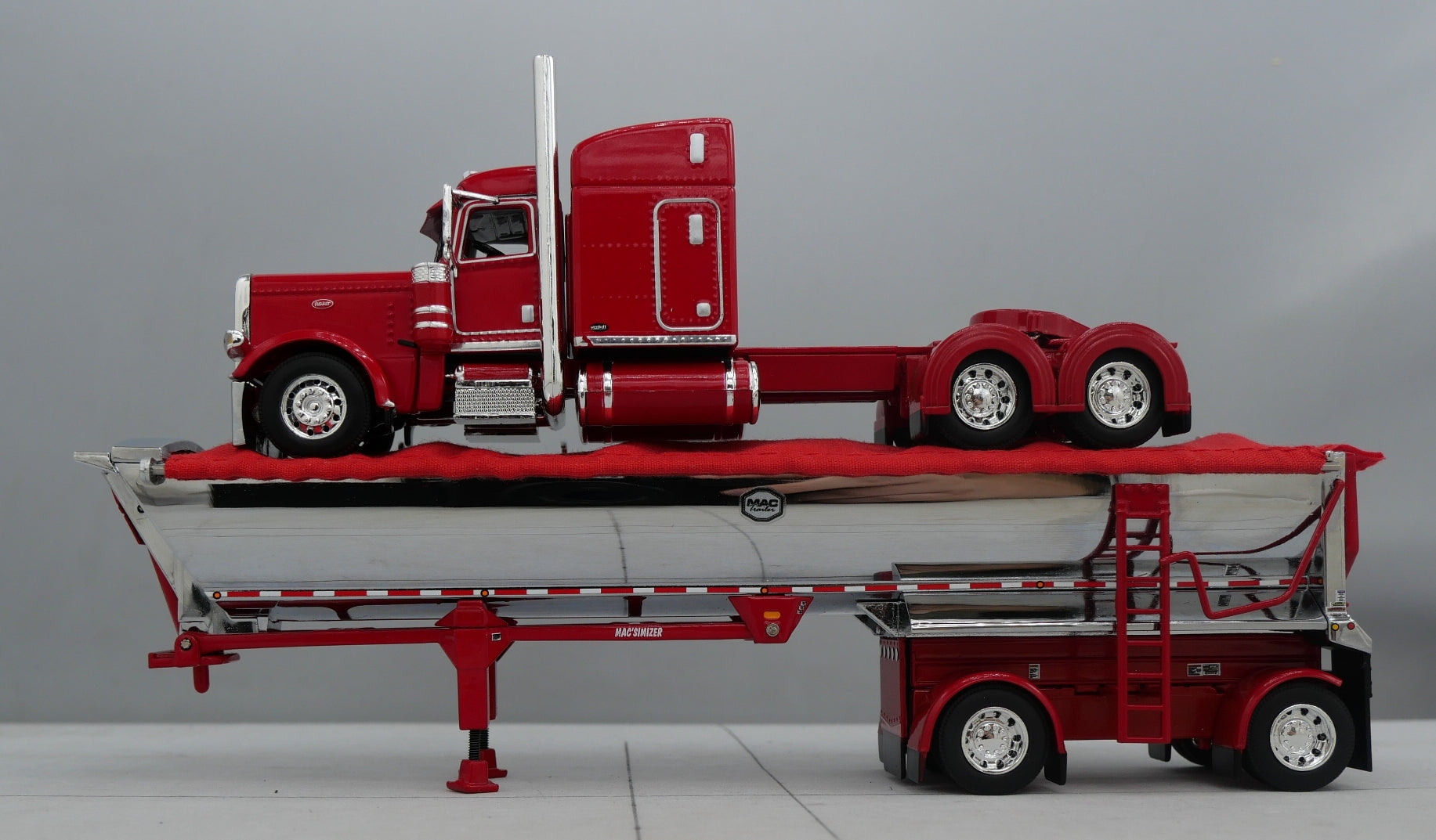 60-1738 1/64 DCP Peterbilt 389 w/ Mac Round Dump Trailer Red Chrome