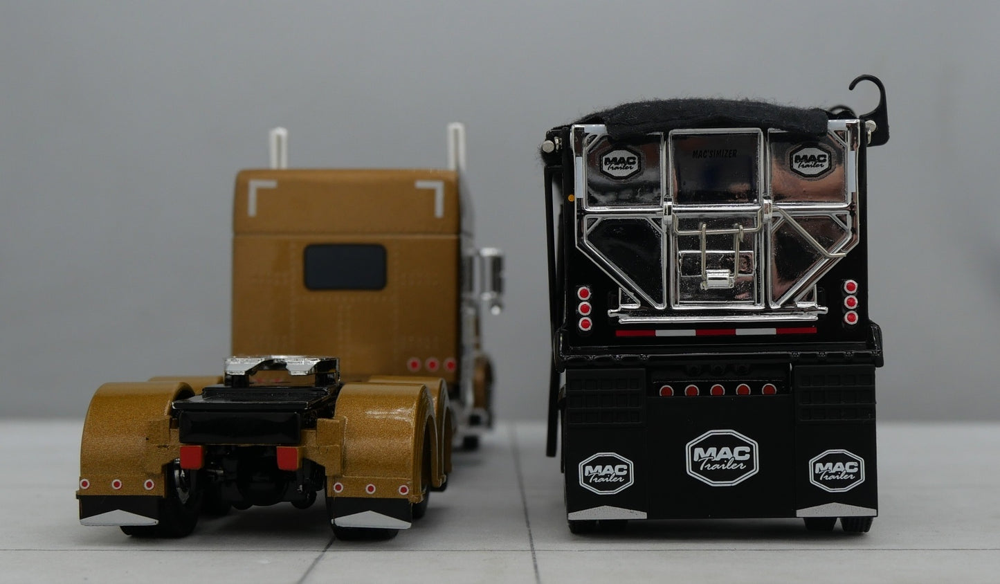 #60-1741 1/64 DCP Peterbilt 389 w/ Mac Round Dump Trailer Gold Black