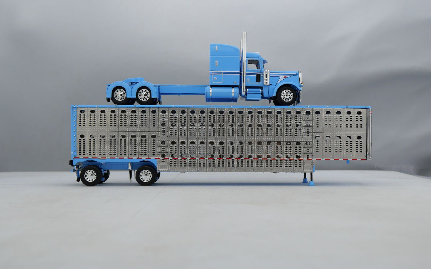 #60-1787 Baby Blue Peterbilt w/ Wilson Spread Axle Livestock Trailer