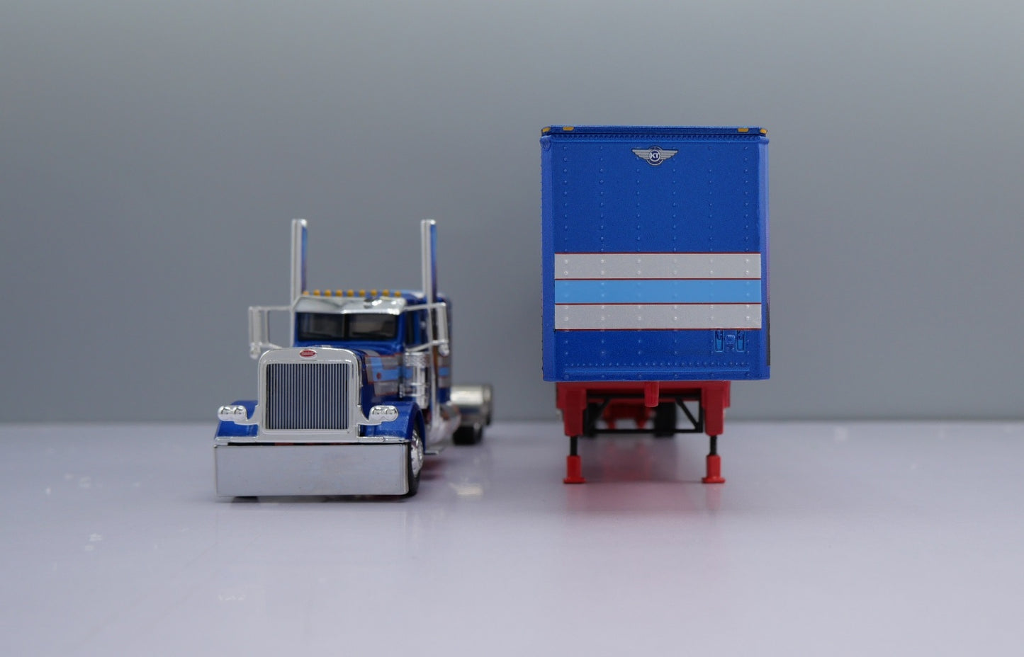 #60-1841 Blue/Red Peterbilt 389 w Tandem Axle Van Trailer.
