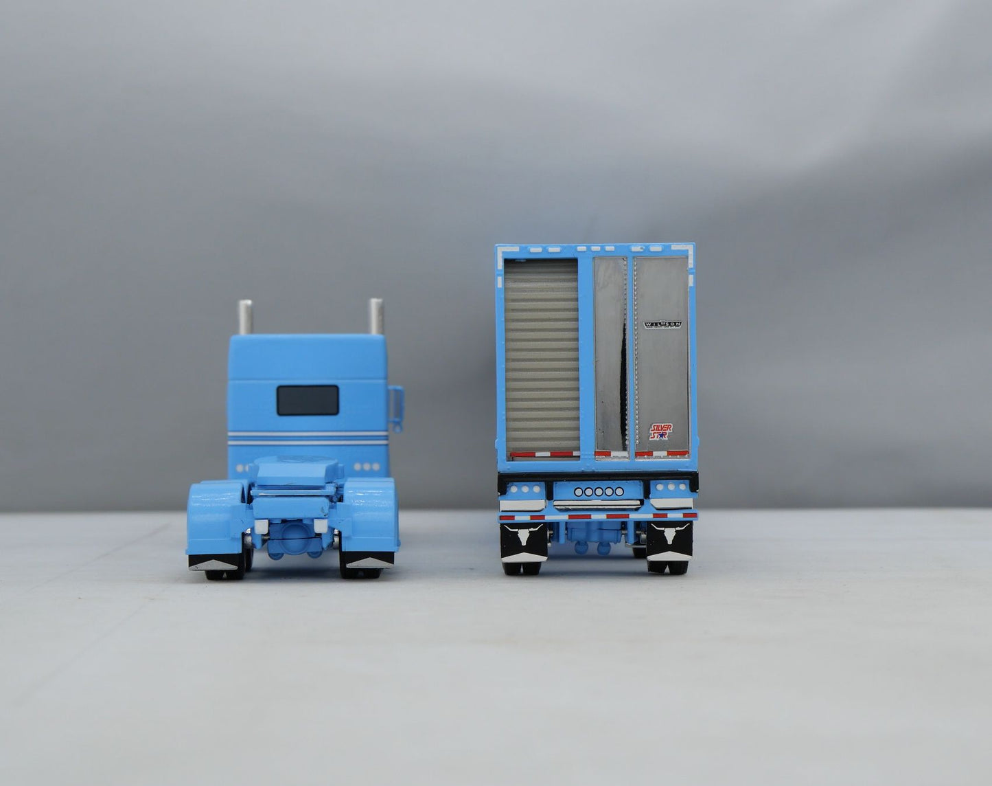 #60-1787 Baby Blue Peterbilt w/ Wilson Spread Axle Livestock Trailer