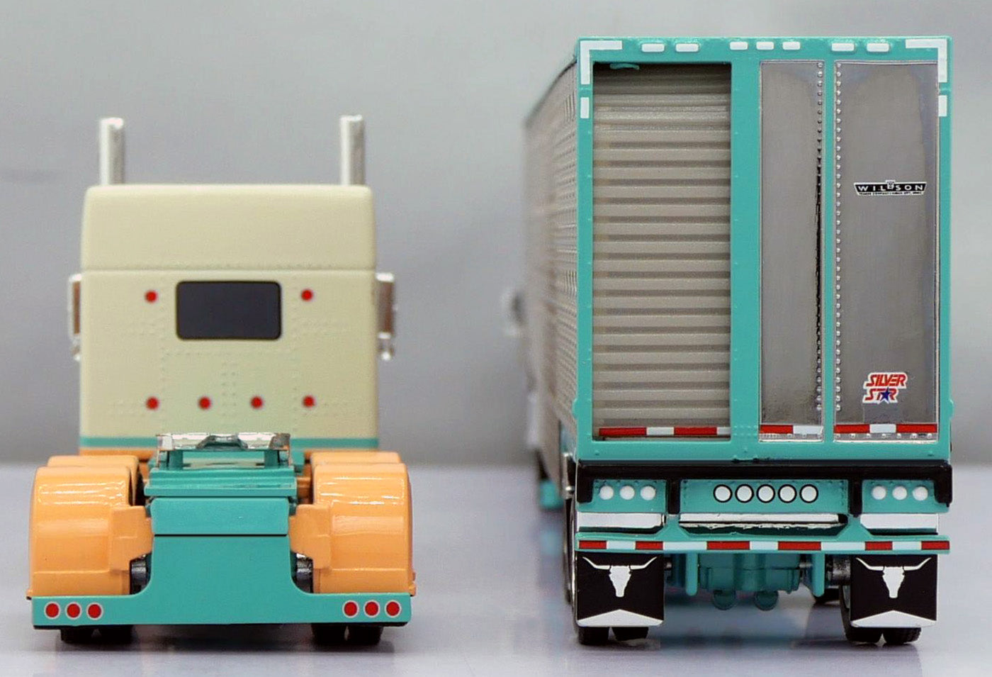 60-1911 Peach Teal Peterbilt w/ Wilson Livestock Trailer