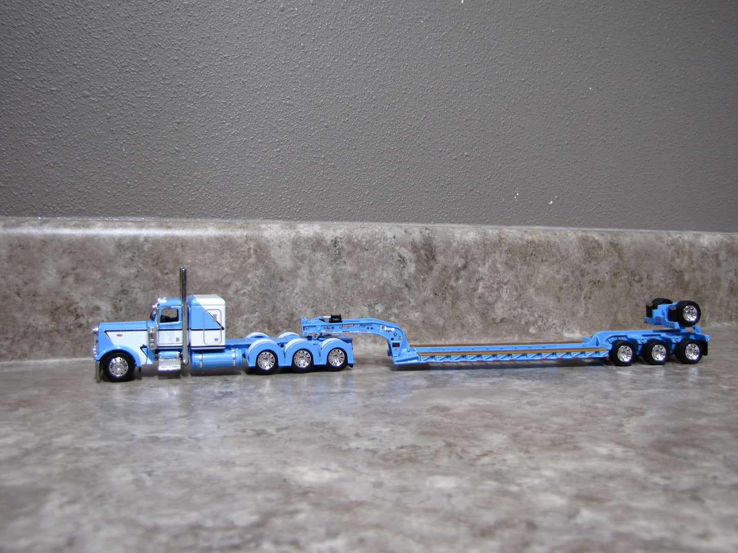 DCP #60-1972 Baby Blue Peterbilt 389 W Lowboy Trailer