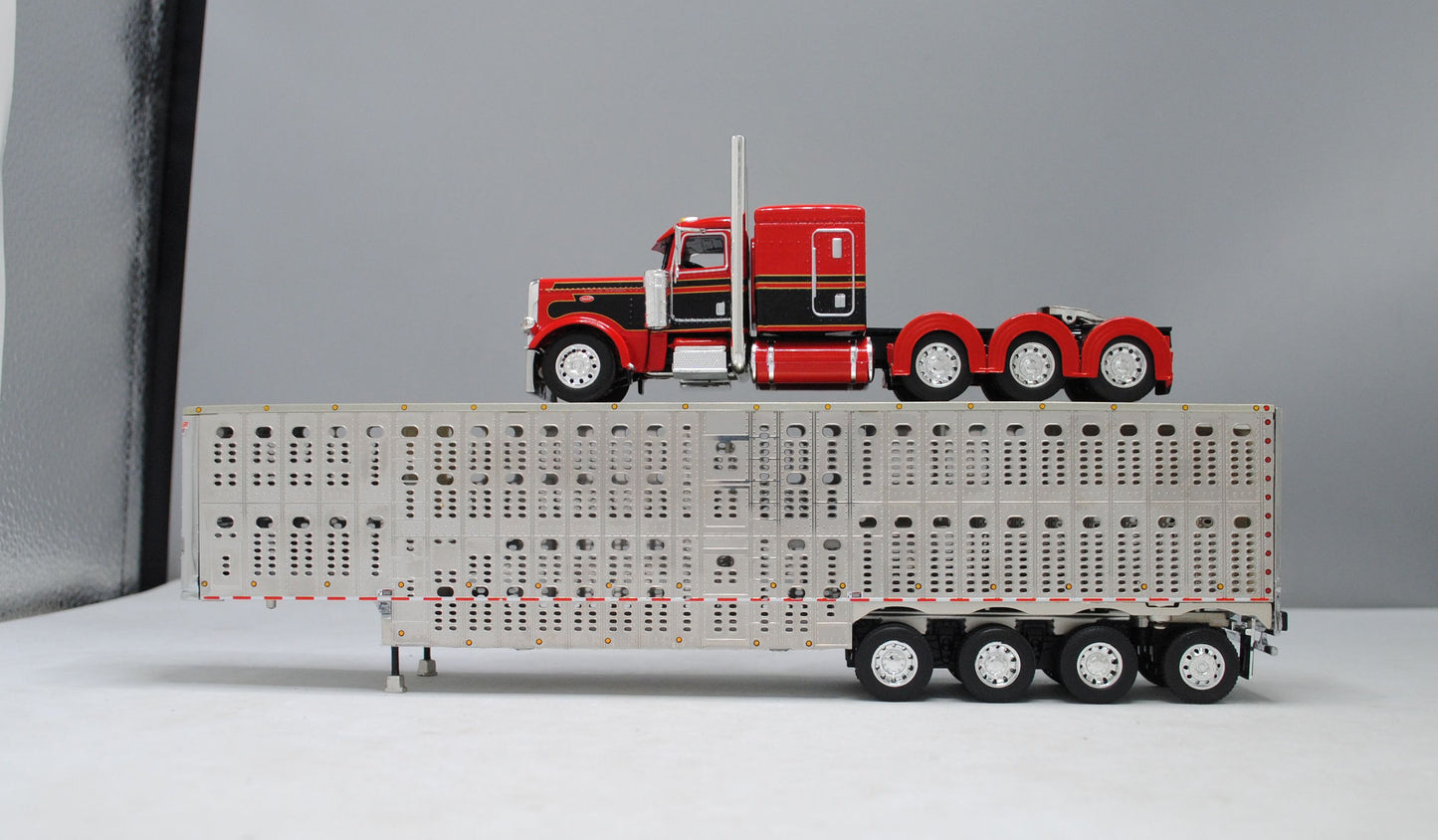 RETIRED #60-1053 Red Black Tri-Axle Peterbilt Wilson Silver Quad Axle Livestock Trailer