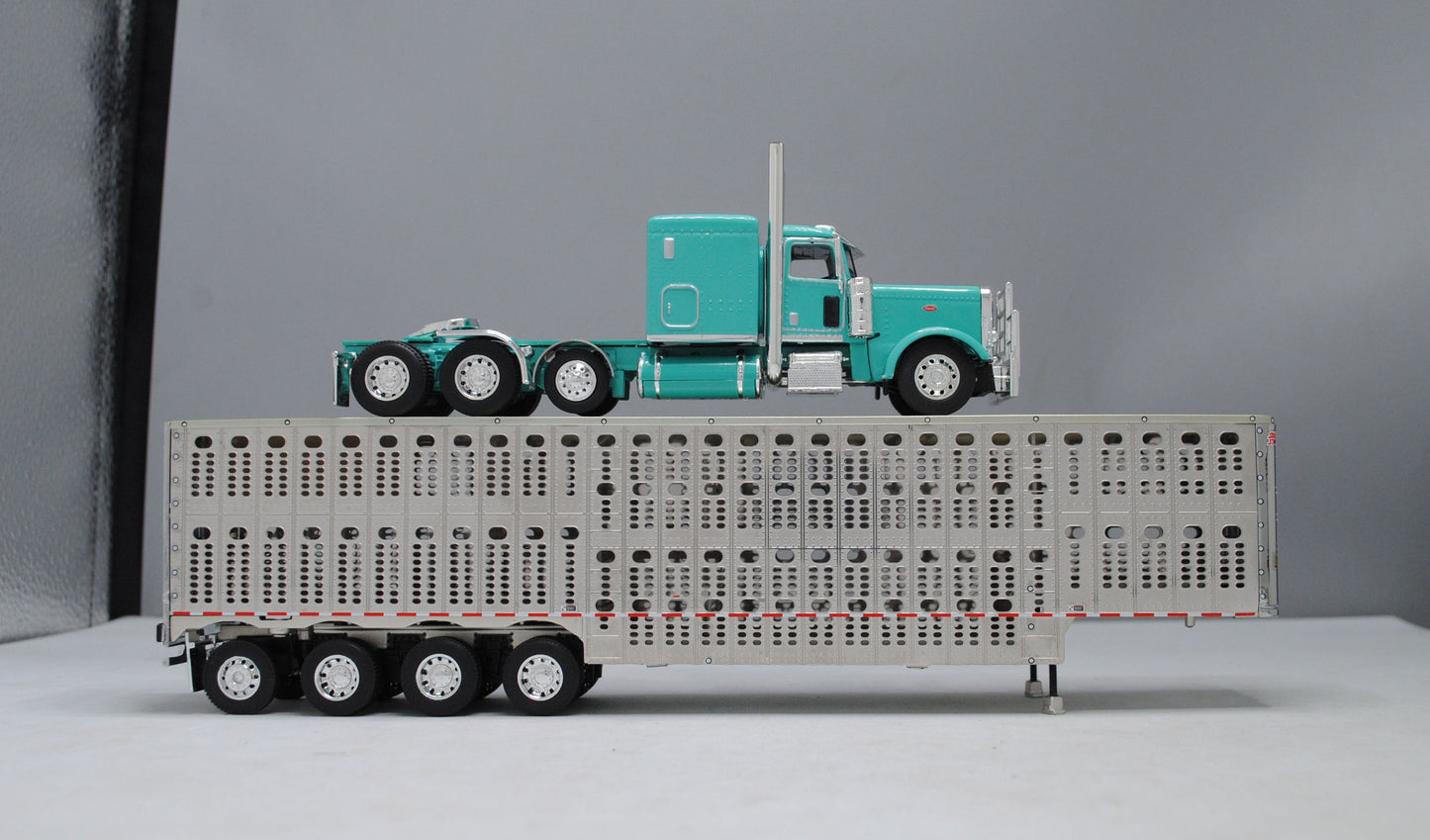 RETIRED #60-1103 Peterbilt Teal Wilson Silver Quad Axle Livestock Trailer