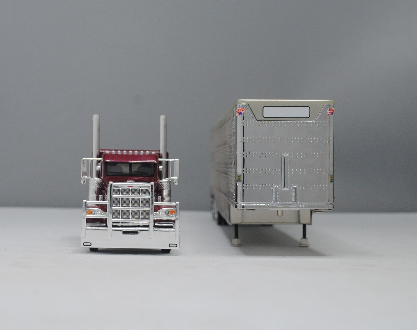 RETIRED #60-1106 Peterbilt Garnet Red Wilson Silver Tri-Axle Livestock Trailer