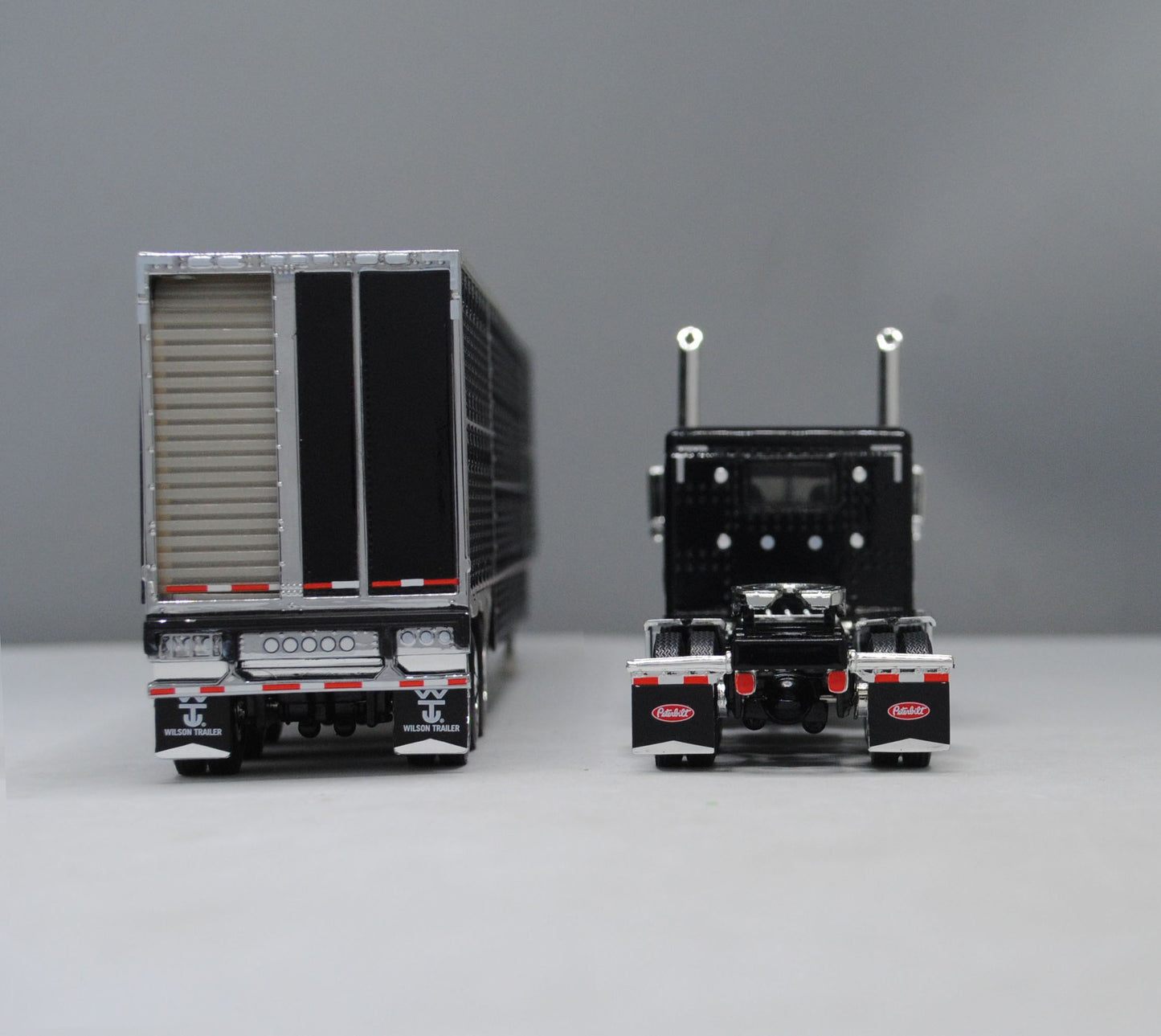 RETIRED #60-1149 Black Peterbilt Tri Axle 389 Wilson Black Tri Axle Livestock Trailer