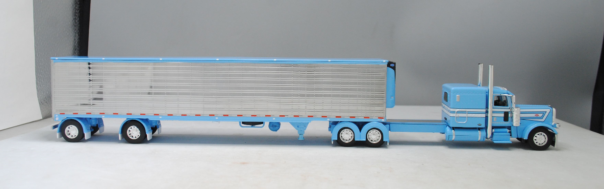 RETIRED #60-1322 1/64 Baby Blue Peterbilt 389 w/Reefer