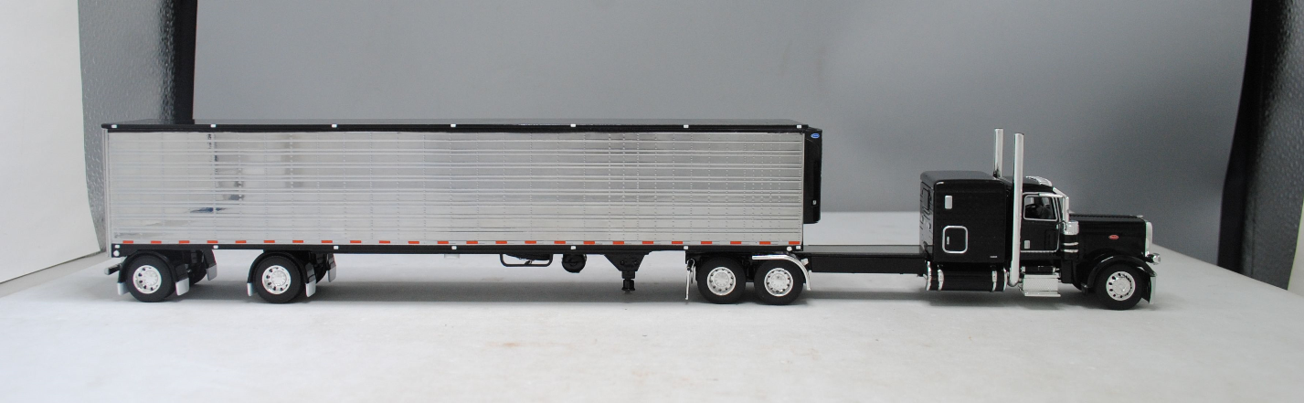 #60-1323 1/64 Black Peterbilt 389 w/Chrome Utility 53' Spread-Axle Carrier Reefer (Black)