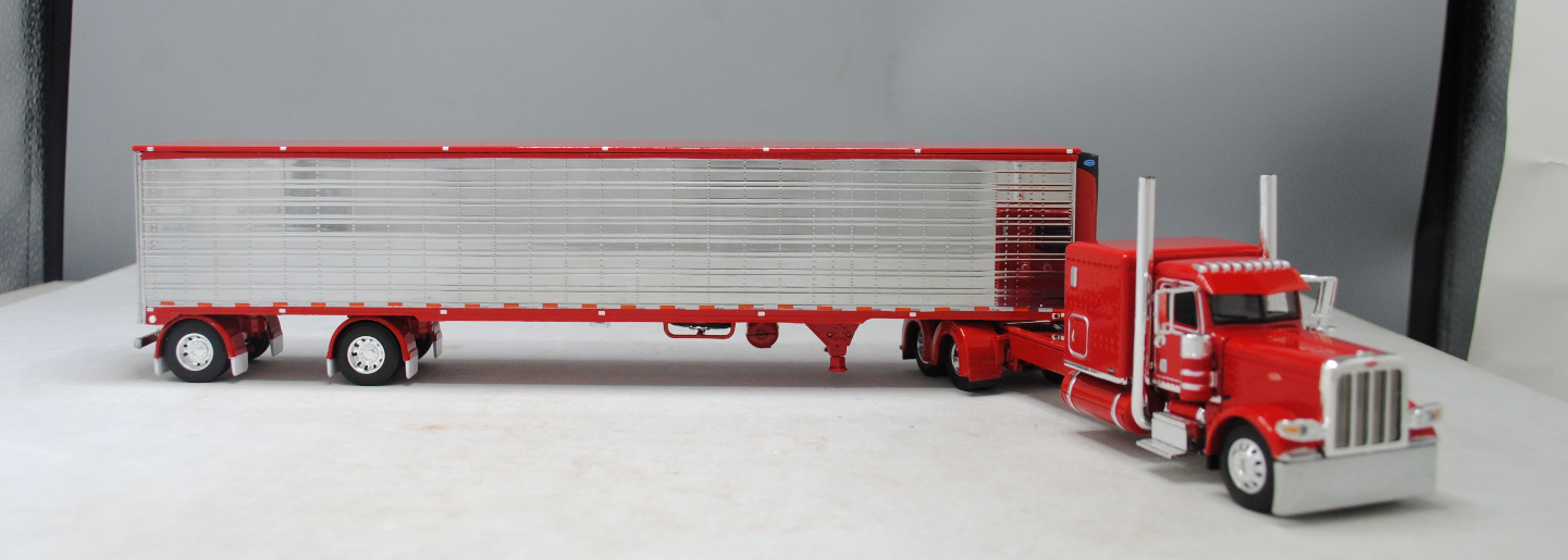 #60-1324 1/64 Red Peterbilt 389 w/Chrome Utility 53' Spread-Axle Carrier Reefer (Red)