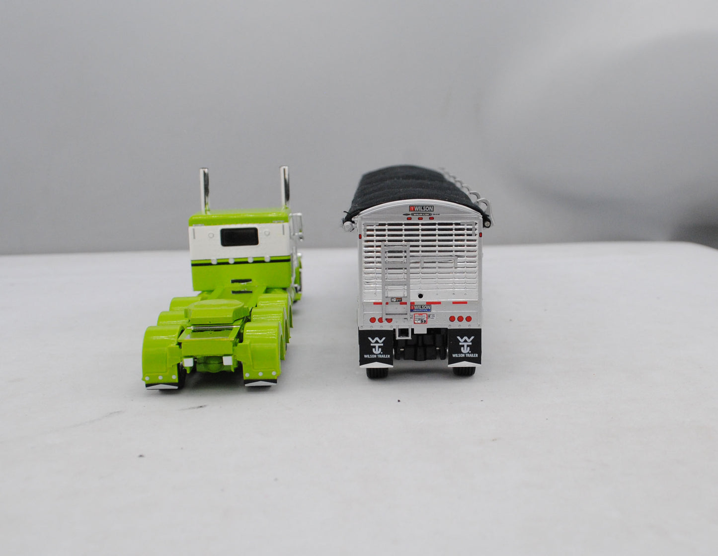 #60-1474 Lime Green White Peterbilt 389 Tri Axle with White Tri Grain Trailer