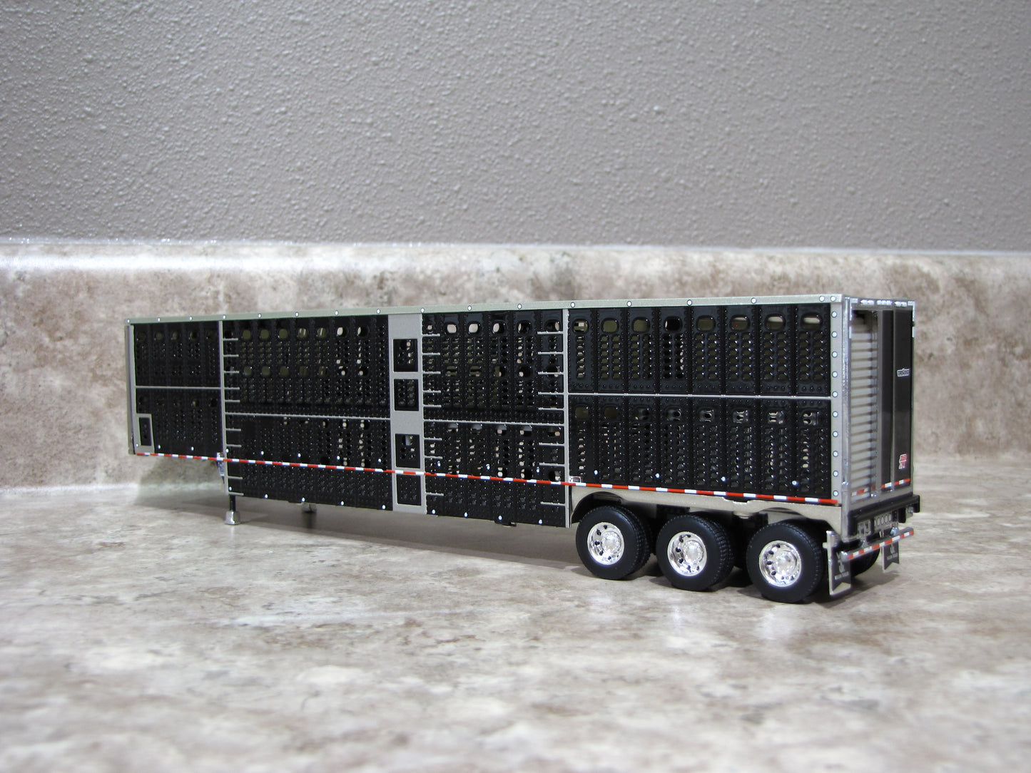 TRL 1149 Black Sided Wilson Tri Axle Livestock Trailer