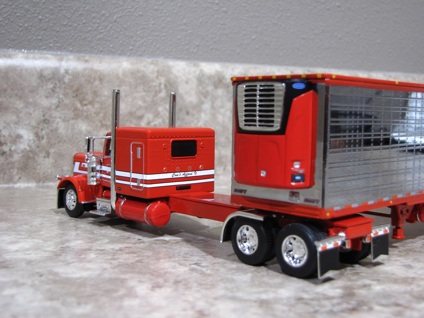 #60-1325 1/64 "Can't Afford It" Jimmy Ganski - JC Ganski Peterbilt 389 w/Chrome Reefer (Red)