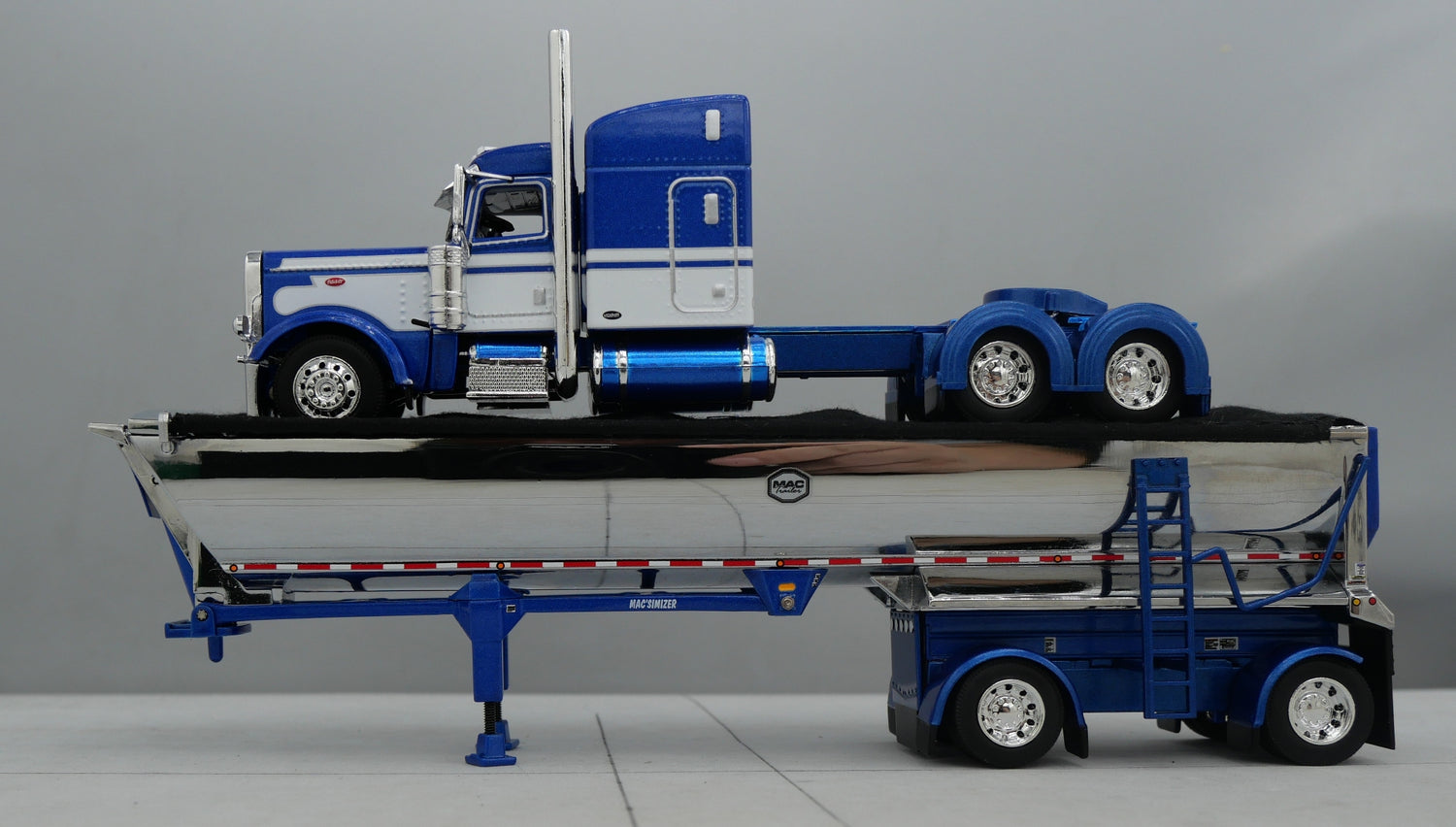 60-1740 1/64 DCP Peterbilt 389 w/ Mac Round Dump Trailer Blue Chrome