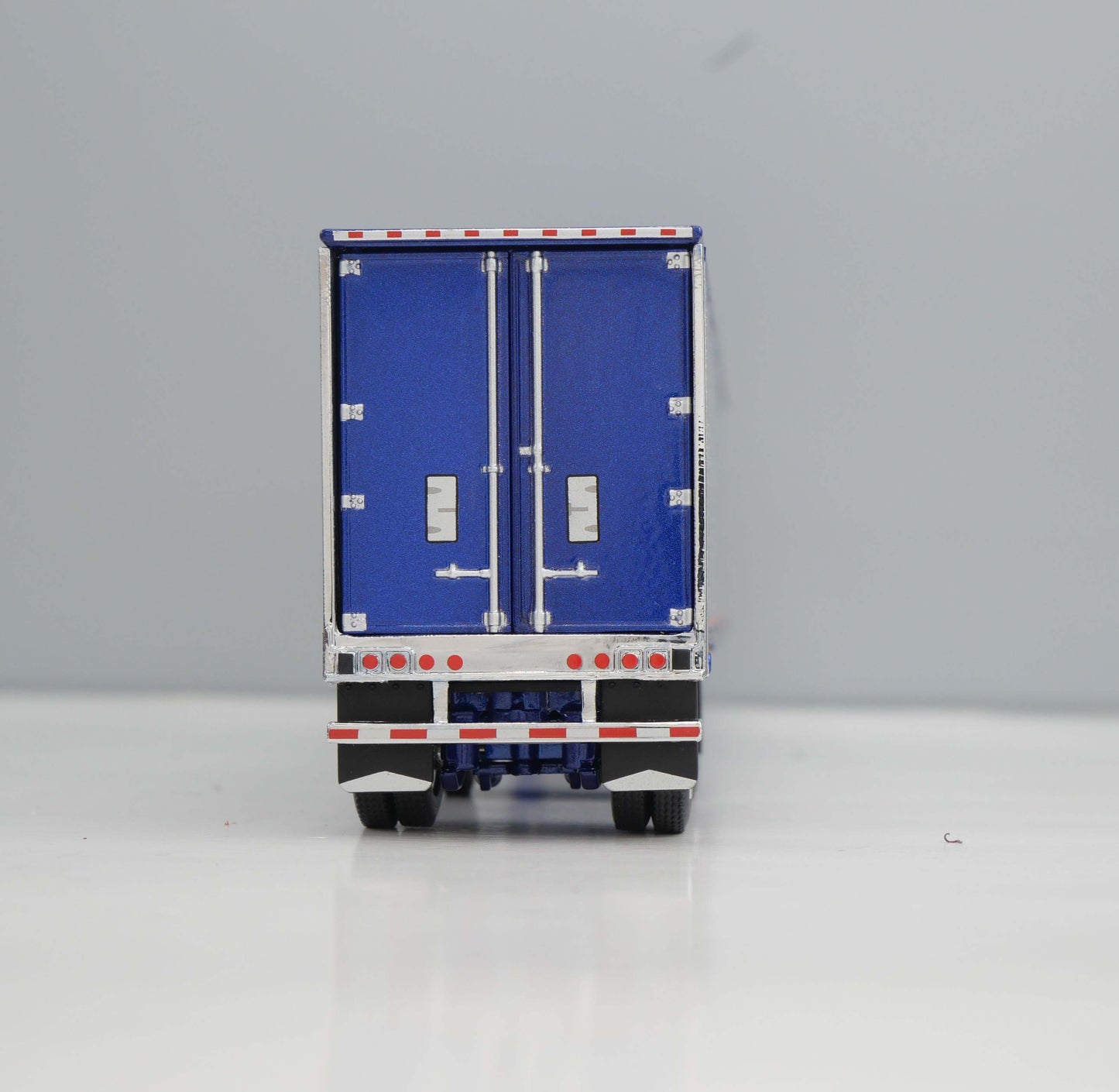 #60-2302 Elite Money Team Blue Peterbilt & Refrigerated Trailer
