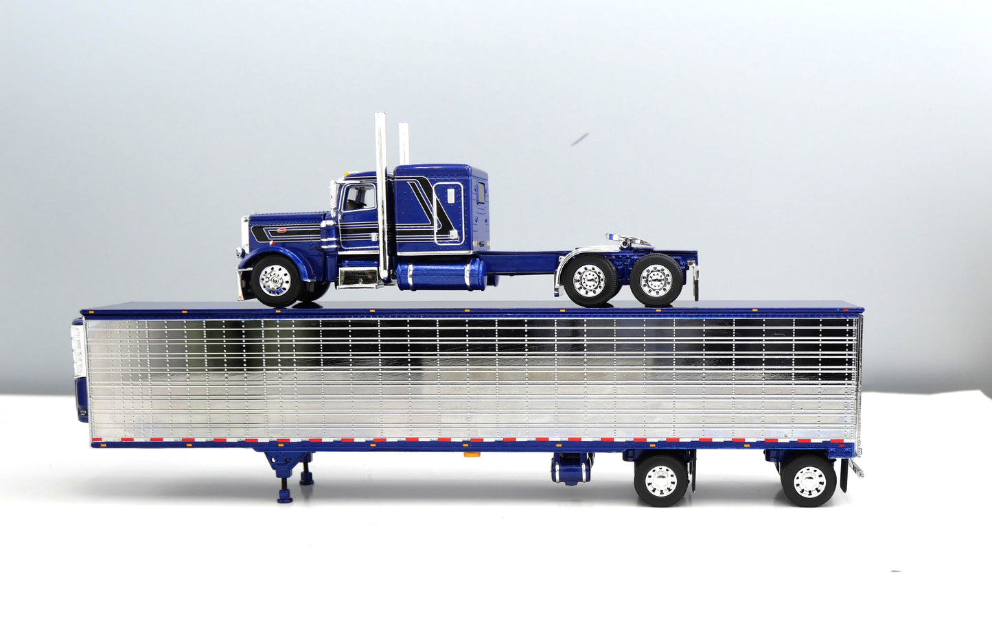 #60-2302 Elite Money Team Blue Peterbilt & Refrigerated Trailer