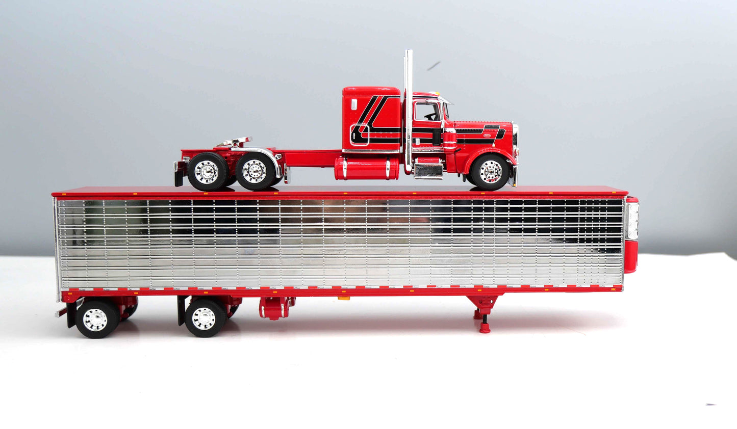 #60-2303 Elite Money Team Red Peterbilt & Refrigerated Trailer