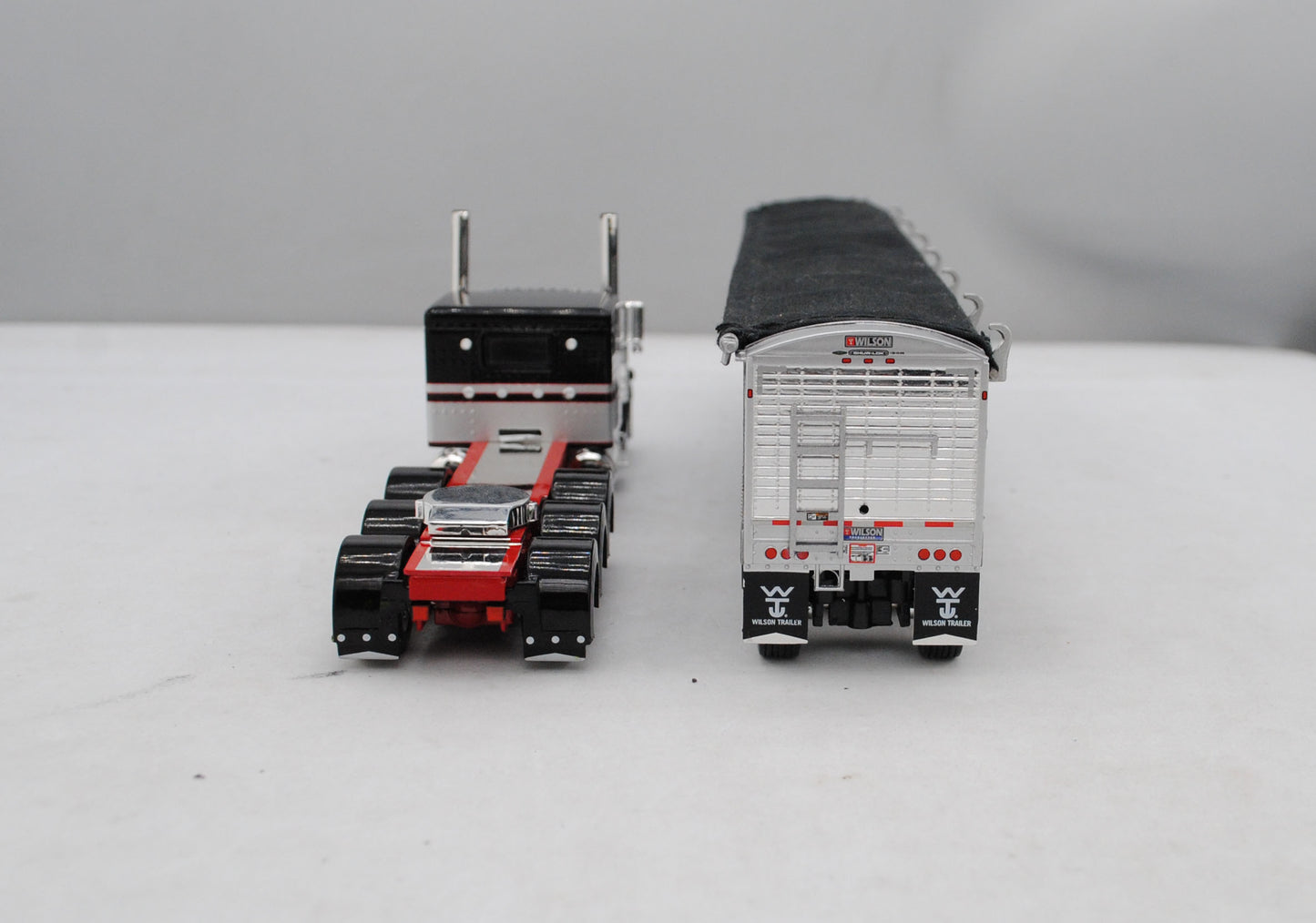 #60-1473 Black Red Silver Peterbilt 389 Tri Axle with Tri Grain Trailer