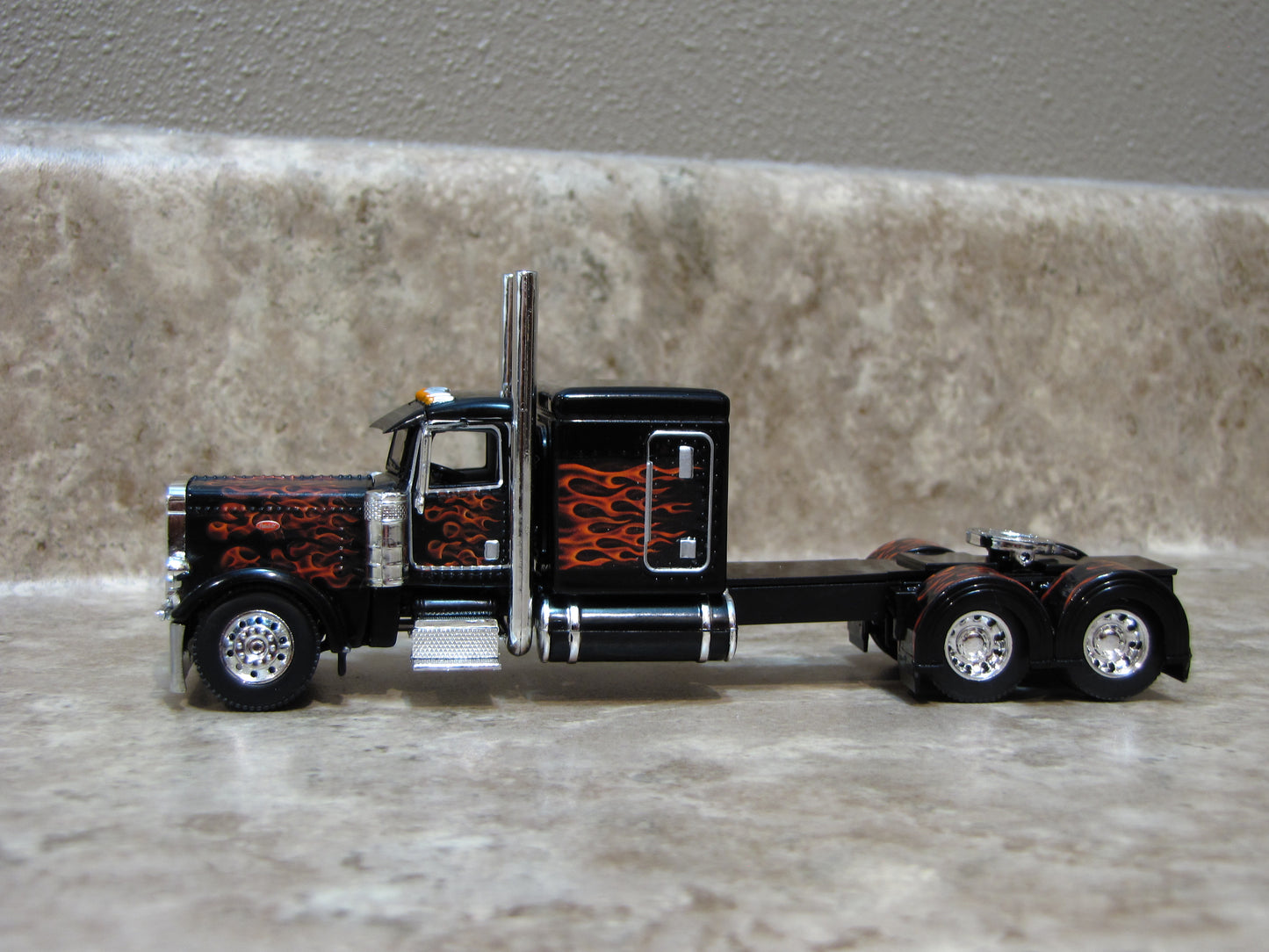 CAB 1104 Black with Orange Flames 389 Peterbilt Semi Truck